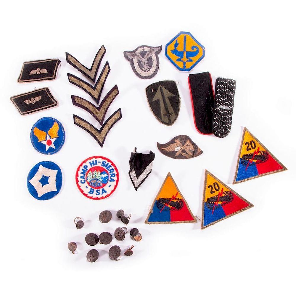 Appraisal: A collection of WWII badges and buttons Various World War