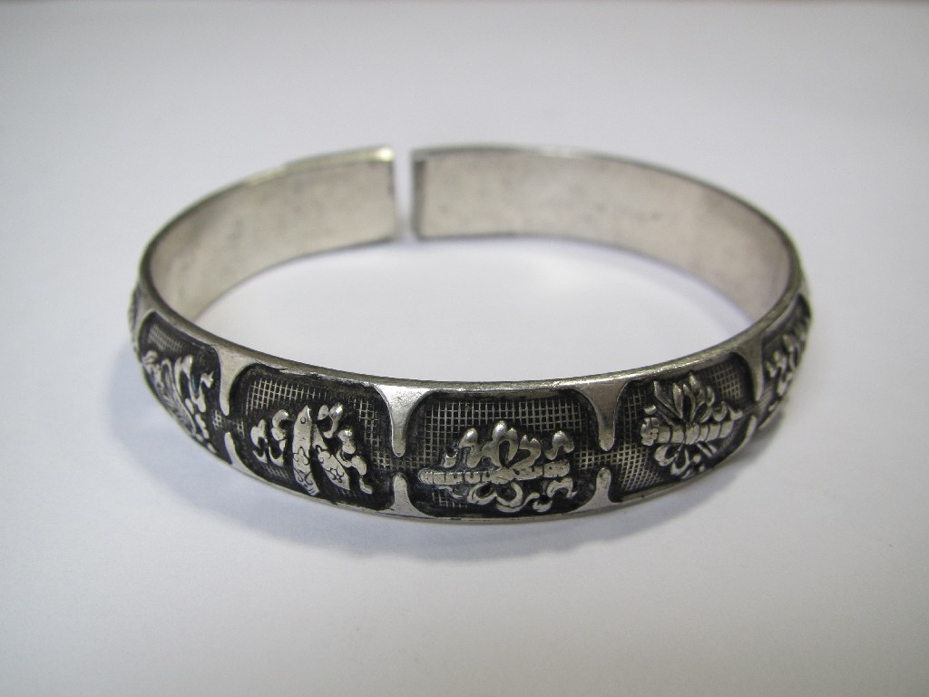 Appraisal: Chinese silver bangle decorated with Chinese characters and foliage