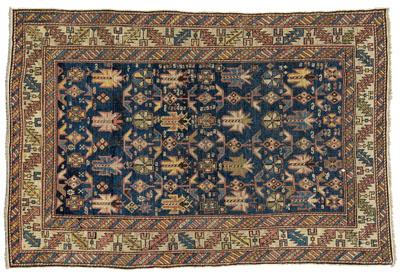 Appraisal: Caucasian rug repeating rectilinear designs on blue field with diagonal