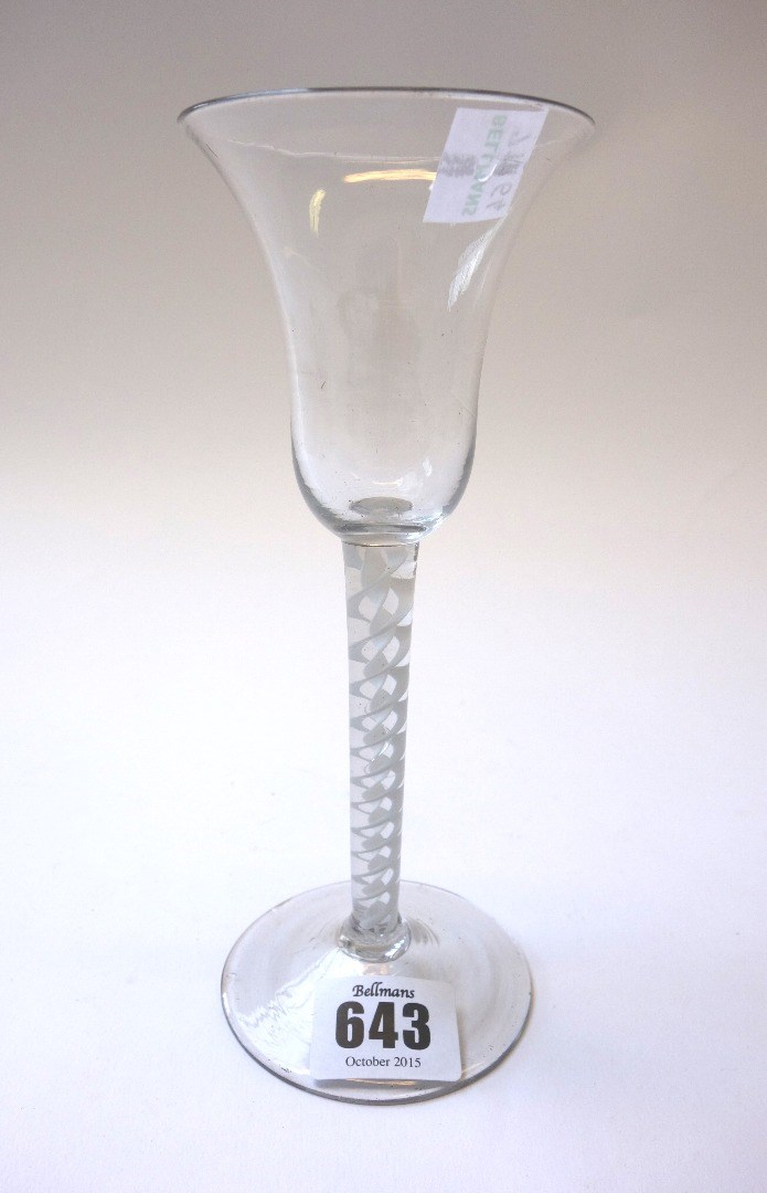 Appraisal: An opaque twist wine glass circa the bell bowl raised