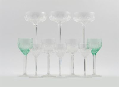 Appraisal: Thirty six glasses with diamond pattern bowls raised on faceted