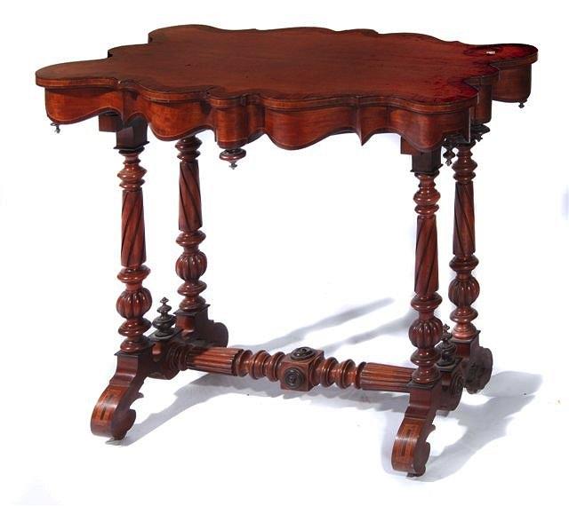 Appraisal: A TH CENTURY MAHOGANY CENTRE TABLE with shaped serpentine top