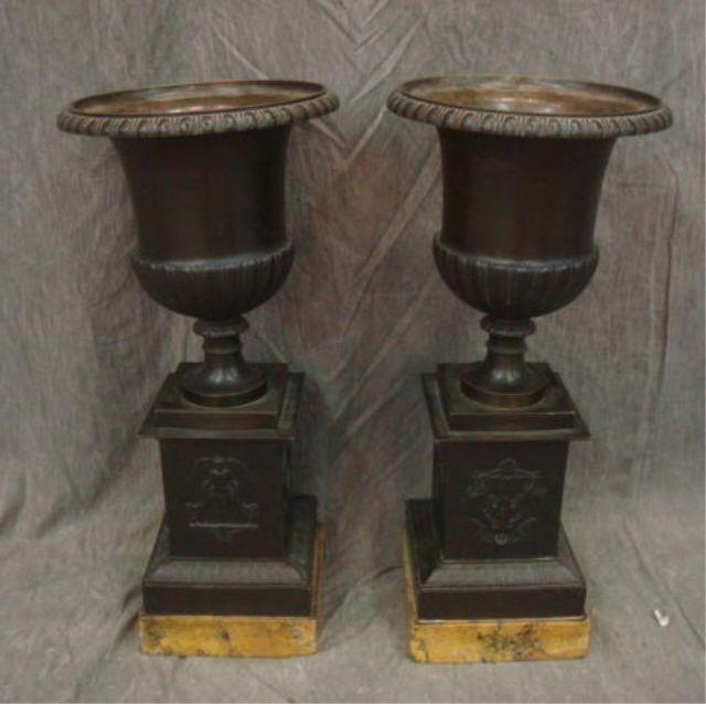 Appraisal: Pair of Bronze Urns on Marble Bases From a North