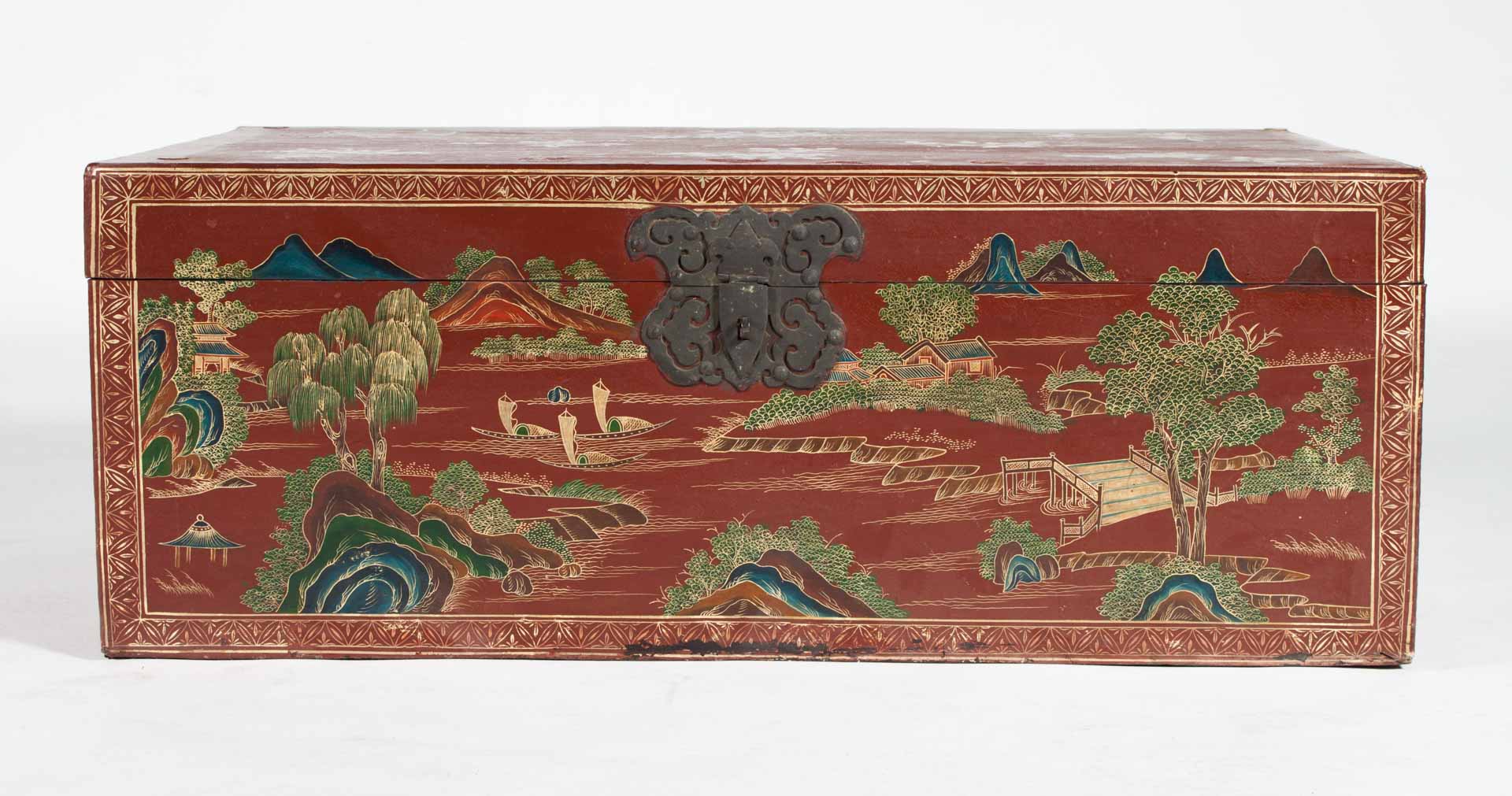 Appraisal: Chinese decorated red lacquered trunk with river scene decoration in