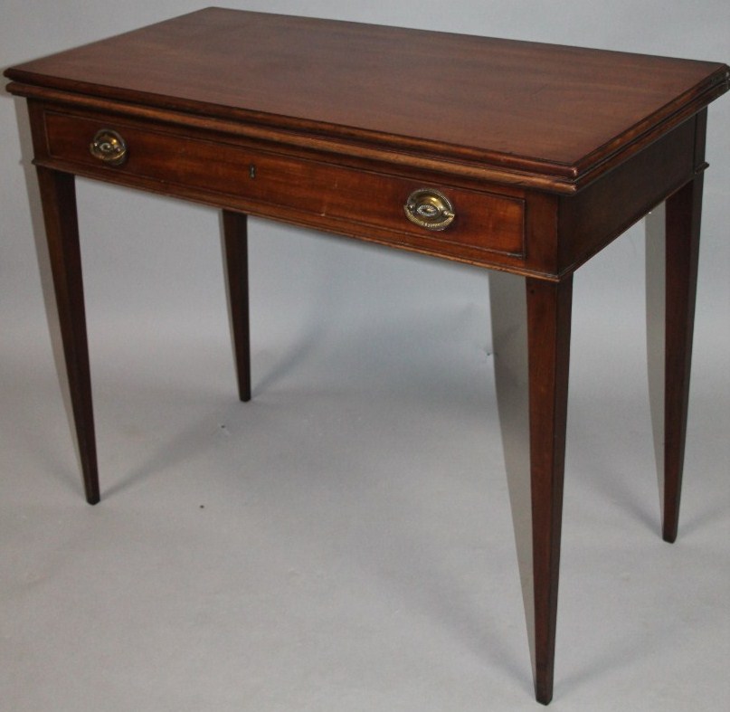 Appraisal: An early thC mahogany fold over side table the moulded