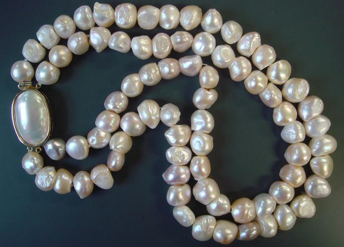 Appraisal: Strand of Baroque Pearls double strand of approx mm baroque