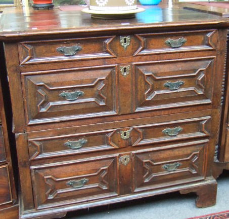 Appraisal: A late th century oak two part chest of four