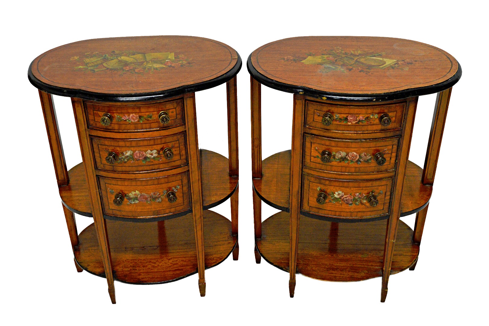 Appraisal: A pair of late th century painted satinwood bedside tables