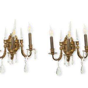 Appraisal: A Pair of Continental Gilt Bronze Three-Light Sconces Early th