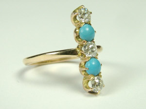 Appraisal: A gold diamond and turquoise 'inline' setting dress ring Set