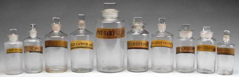 Appraisal: Lot of Glass Druggist Shop Bottles Description Ten clear glass