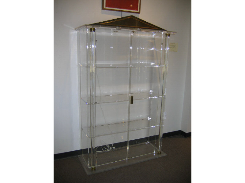 Appraisal: ACRYLIC DISPLAY CABINET in the classical style with pair columnar