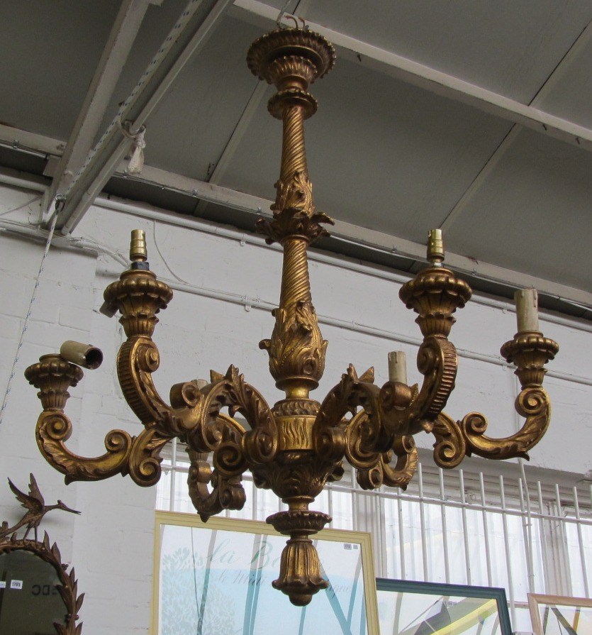 Appraisal: A giltwood six branch chandelier th century the acanthus carved