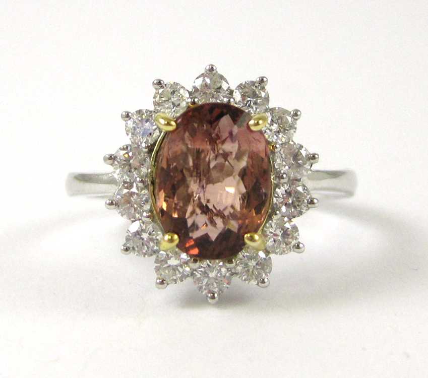 Appraisal: PINK TOURMALINE AND FOURTEEN KARAT GOLD RING The white and