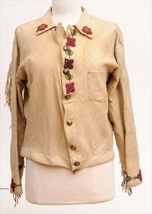 Appraisal: LADY'S BUCKSKIN JACKET With beadwork and fringe x in