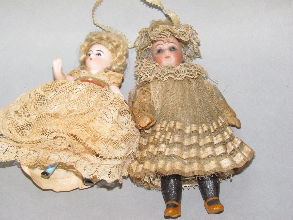 Appraisal: MINIATURE BISQUE HEAD DOLLSboth with antique dresses as found