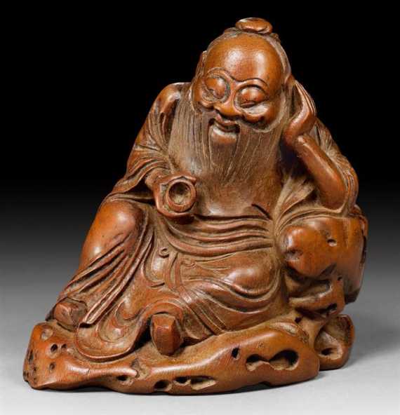 Appraisal: A BAMBOO CARVING OF THE DRUNKEN TANG DAYNASTY POET LI