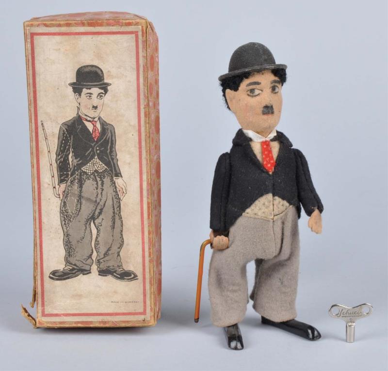 Appraisal: German Schuco Charlie Chaplin Walking Toy Includes scarce original box