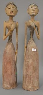 Appraisal: Pair of large painted carved wood South American figures of