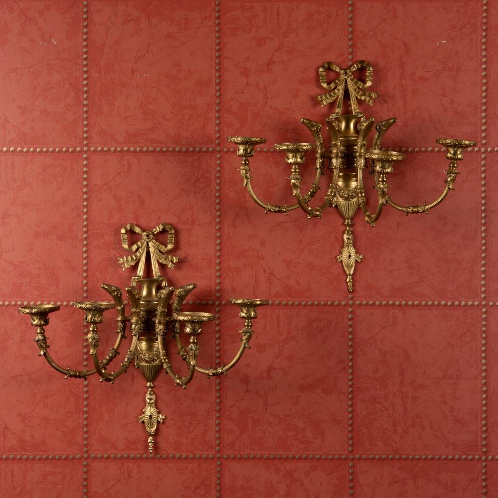 Appraisal: PAIR OF GILT BRONZE RAMS HEAD SCONCES An early th