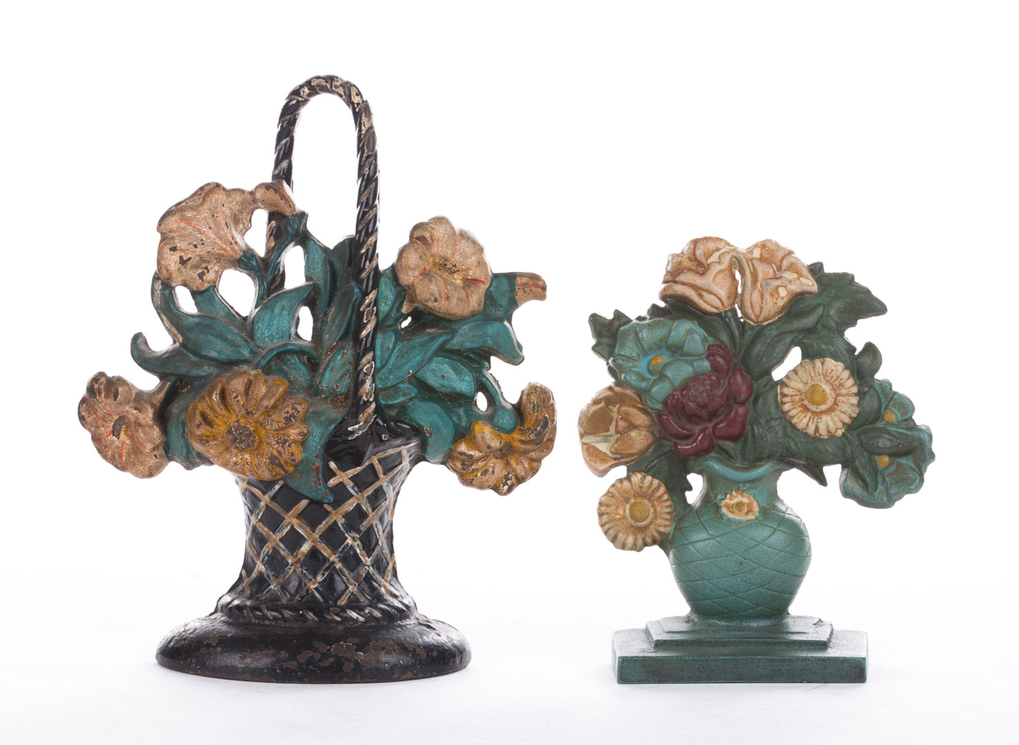 Appraisal: Two cast iron flower basket doorstops large flower basket probably