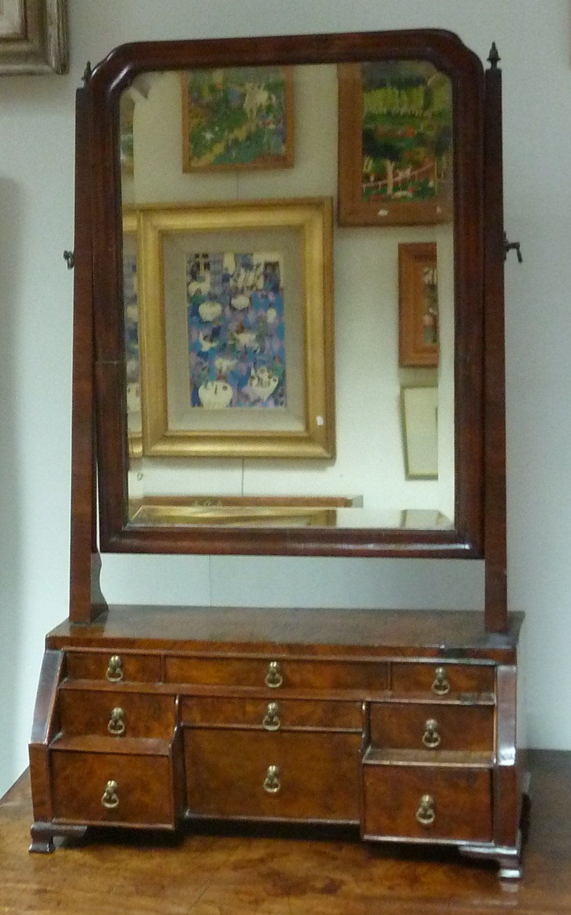 Appraisal: A Queen Anne walnut dressing mirror with configuration of nine