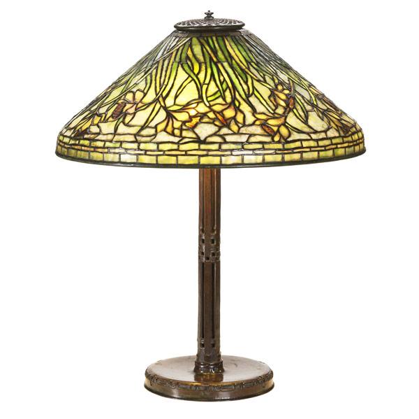 Appraisal: TIFFANY STUDIOSTable lamp with Daffodil shade over a three-socket Secessionist