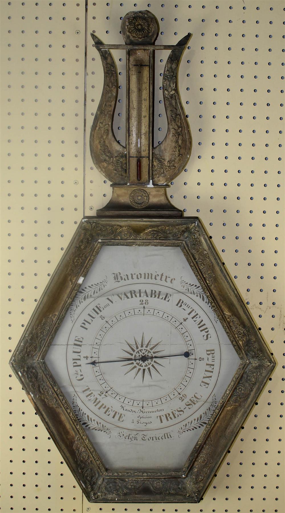 Appraisal: FRENCH EMPIRE GILT BAROMETER The hexagonal case centered a dial