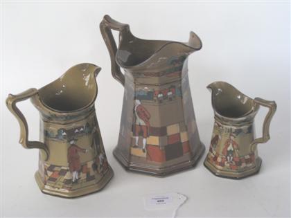 Appraisal: Three Deldare ware pottery pitchers buffalo pottery buffalo new york