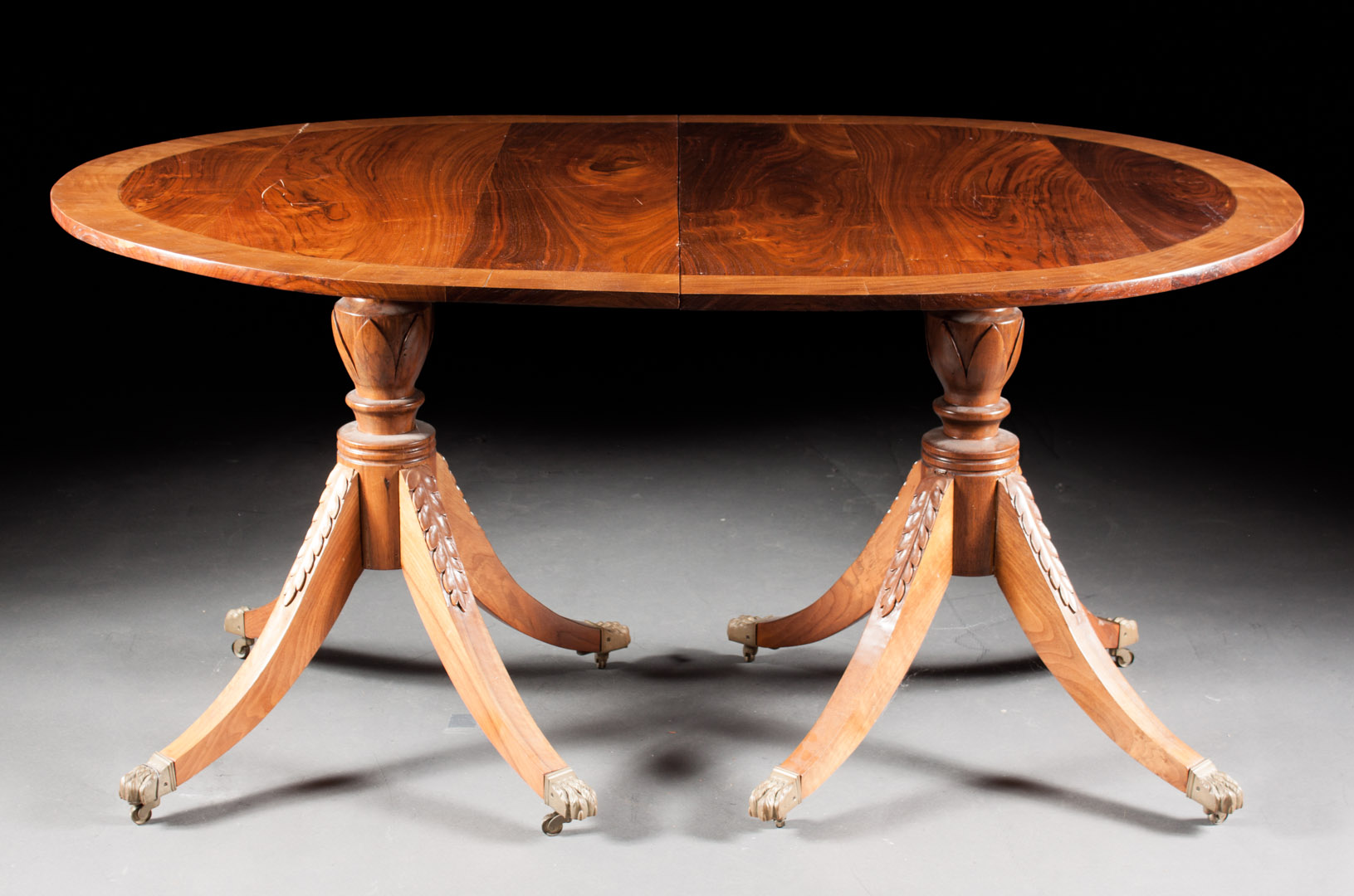 Appraisal: Federal style banded mahogany dining table th century made by