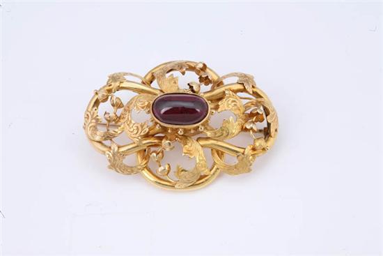 Appraisal: VICTORIAN GARNET BROOCH Center cabochon bezel set with granulated accents