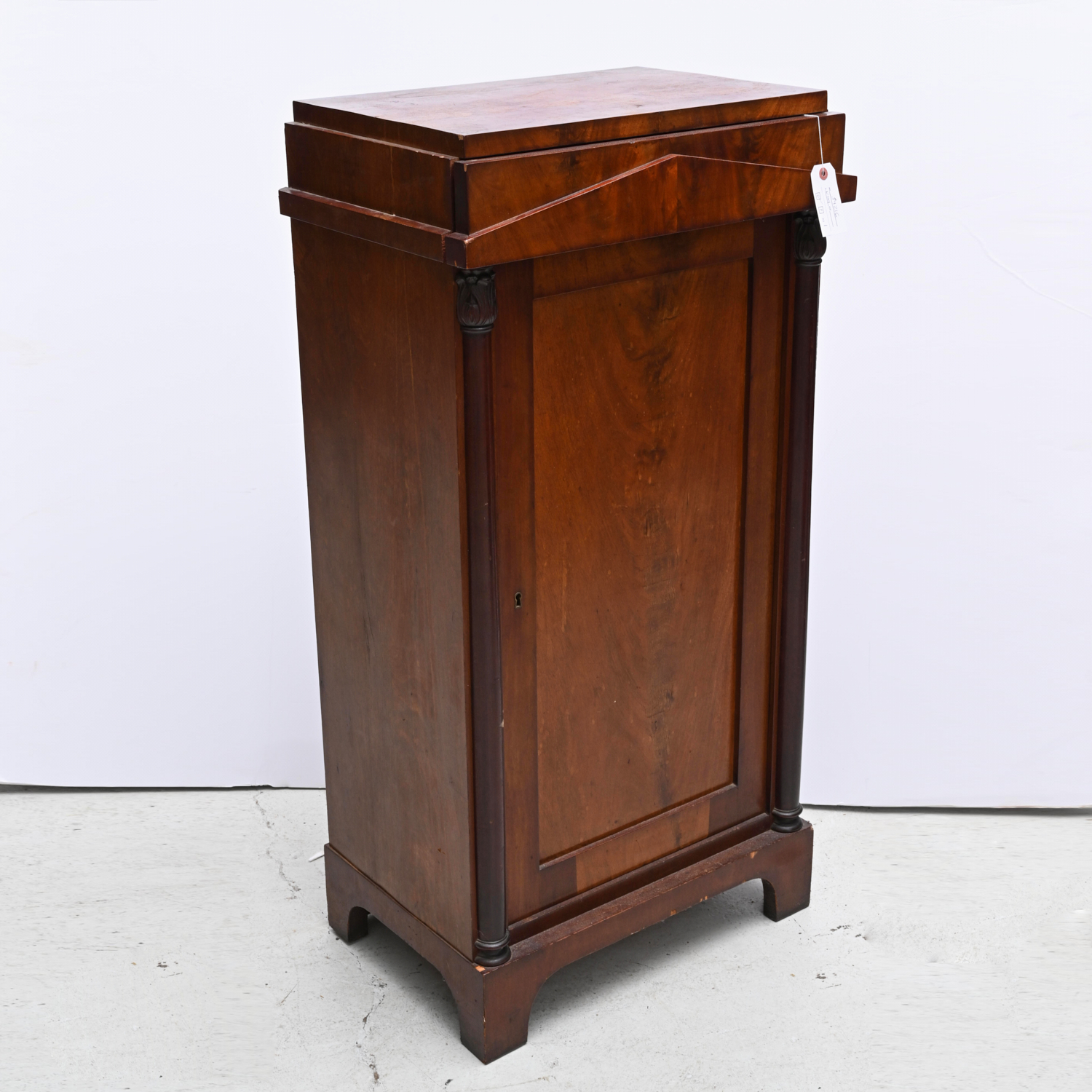 Appraisal: ANTIQUE BIEDERMEIER STYLE PEDESTAL CABINET th c figured mahogany pedestal