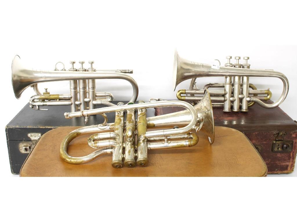 Appraisal: Two Besson silver plated cornets together with a J Higham