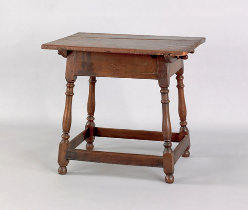 Appraisal: Pennsylvania walnut tavern table the rectangular top overhanging a molded