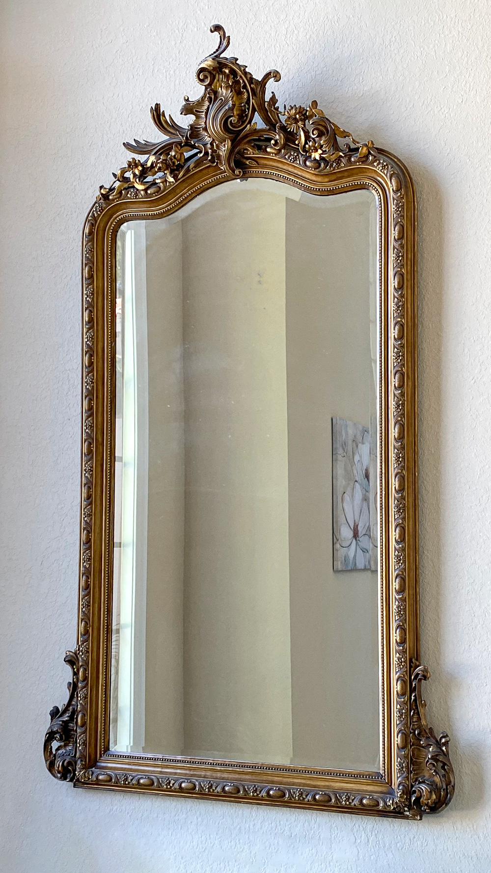 Appraisal: PALATIAL GILT CARVED PARLOR MIRROR Massive beveled gilt mirror having