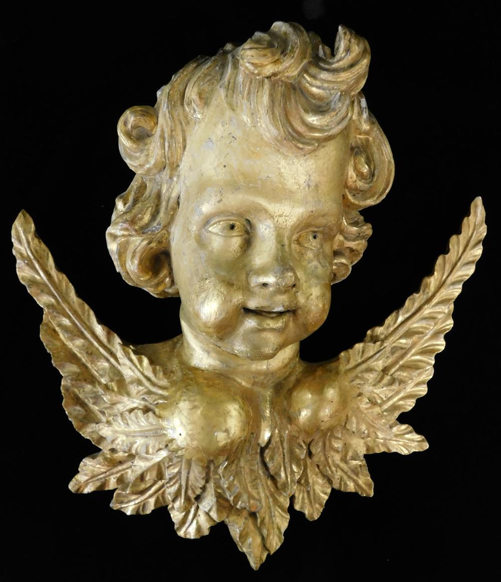 Appraisal: Carved wood and gilt angel head large head with smaller