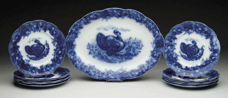 Appraisal: FLOW BLUE GAME SET WITH TURKEYS BY WEDGWOOD Set consists