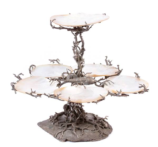 Appraisal: A silvered metal and shellwork table centerpiece height in diameter