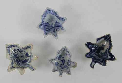 Appraisal: Four Staffordshire blue and white leaf shaped pickle dishes transfer