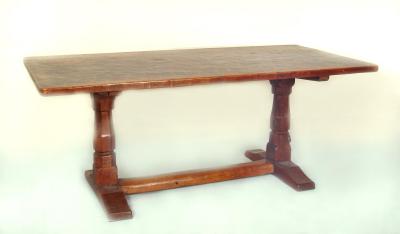 Appraisal: AN ADZED OAK REFECTORY TABLE by Robert Mouseman Thompson raised