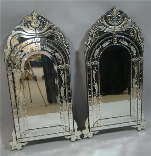 Appraisal: PAIR OF VENETIAN ETCHED GLASS MIRRORS the arched mirrors with