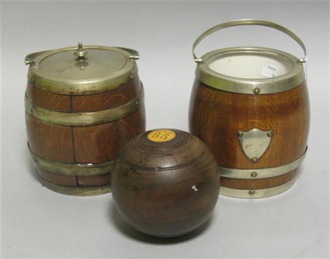 Appraisal: LIGNUM VITAE BALL AND TWO BISCUIT BARRELS The first by