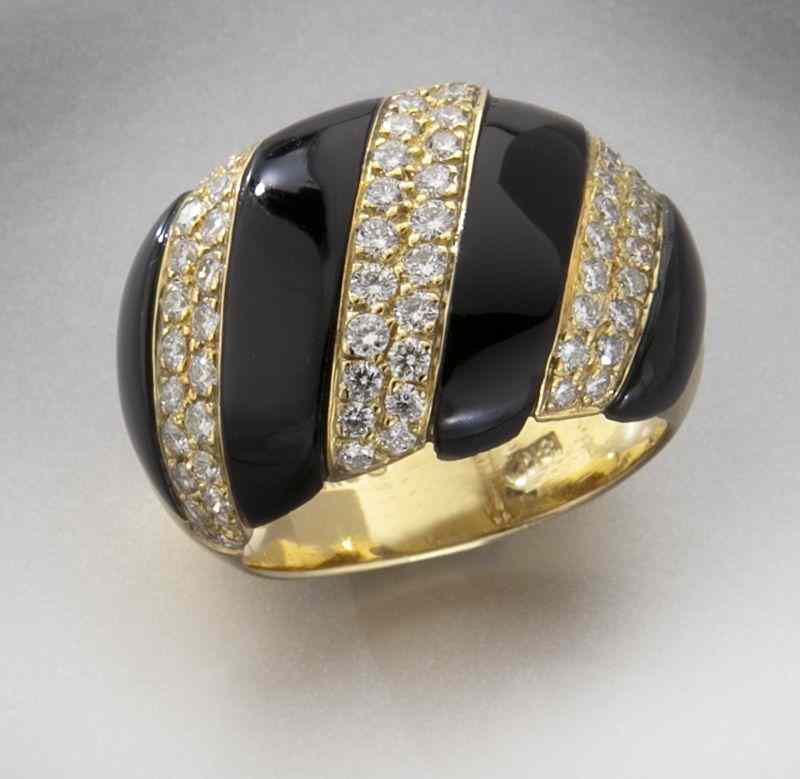 Appraisal: K gold diamond and black onyx dinner ringin the style