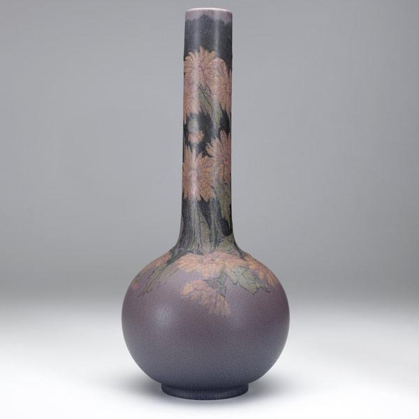 Appraisal: ELIZABETH LINCOLNROOKWOODTall Decorated Mat vase with mums Shallow shaved area