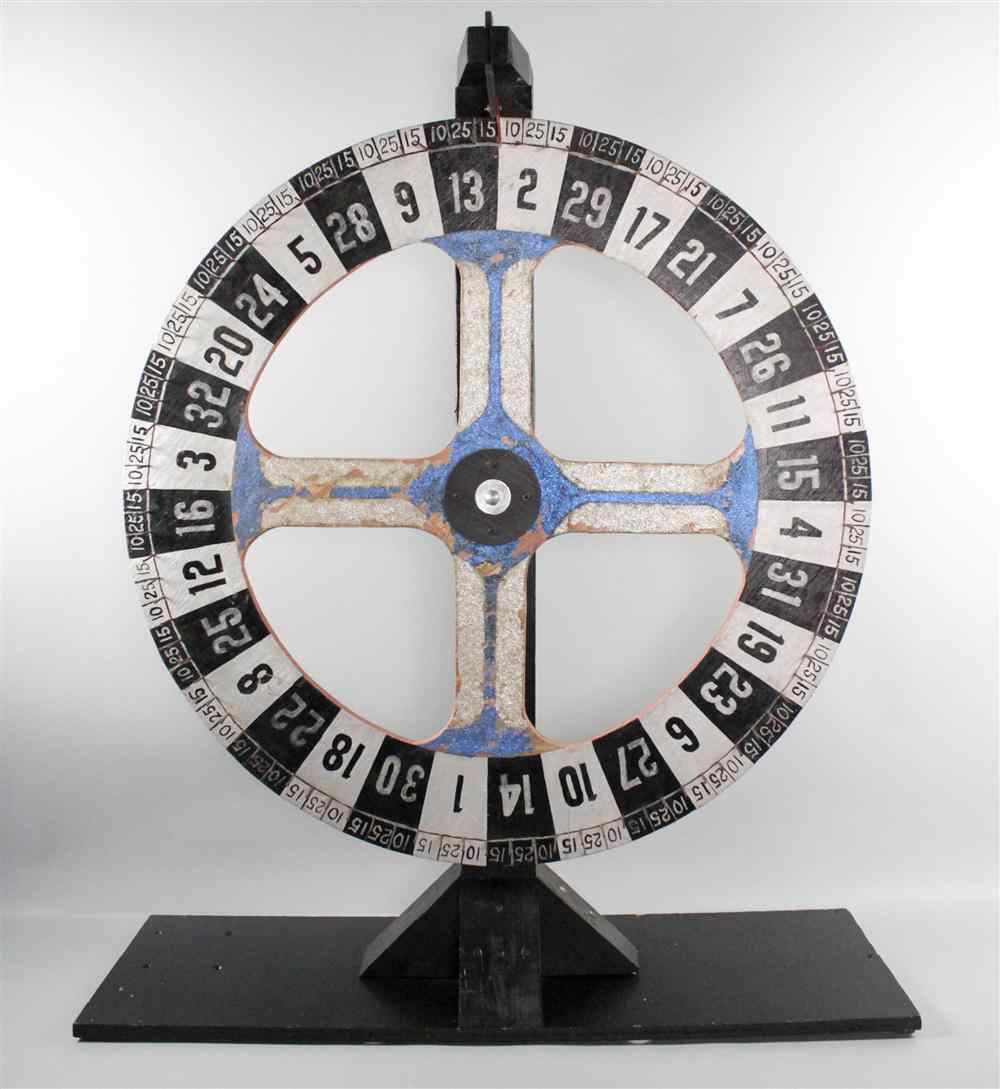 Appraisal: HAND DECORATED VINTAGE WOODEN GAMING WHEEL ON STAND having a