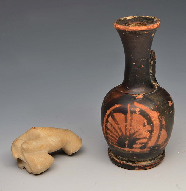 Appraisal: A HELLENISTIC PERIOD LEKYTHOS OR OIL FLASK with anthemion decoration