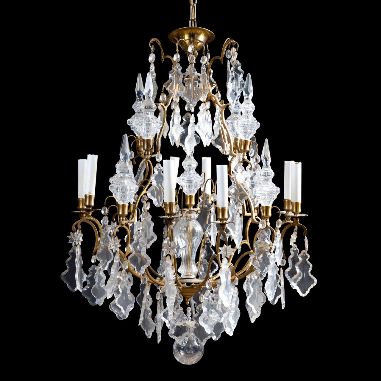 Appraisal: LOUIS XV STYLE EIGHT LIGHT CRYSTAL CHANDELIER Continental bronze and