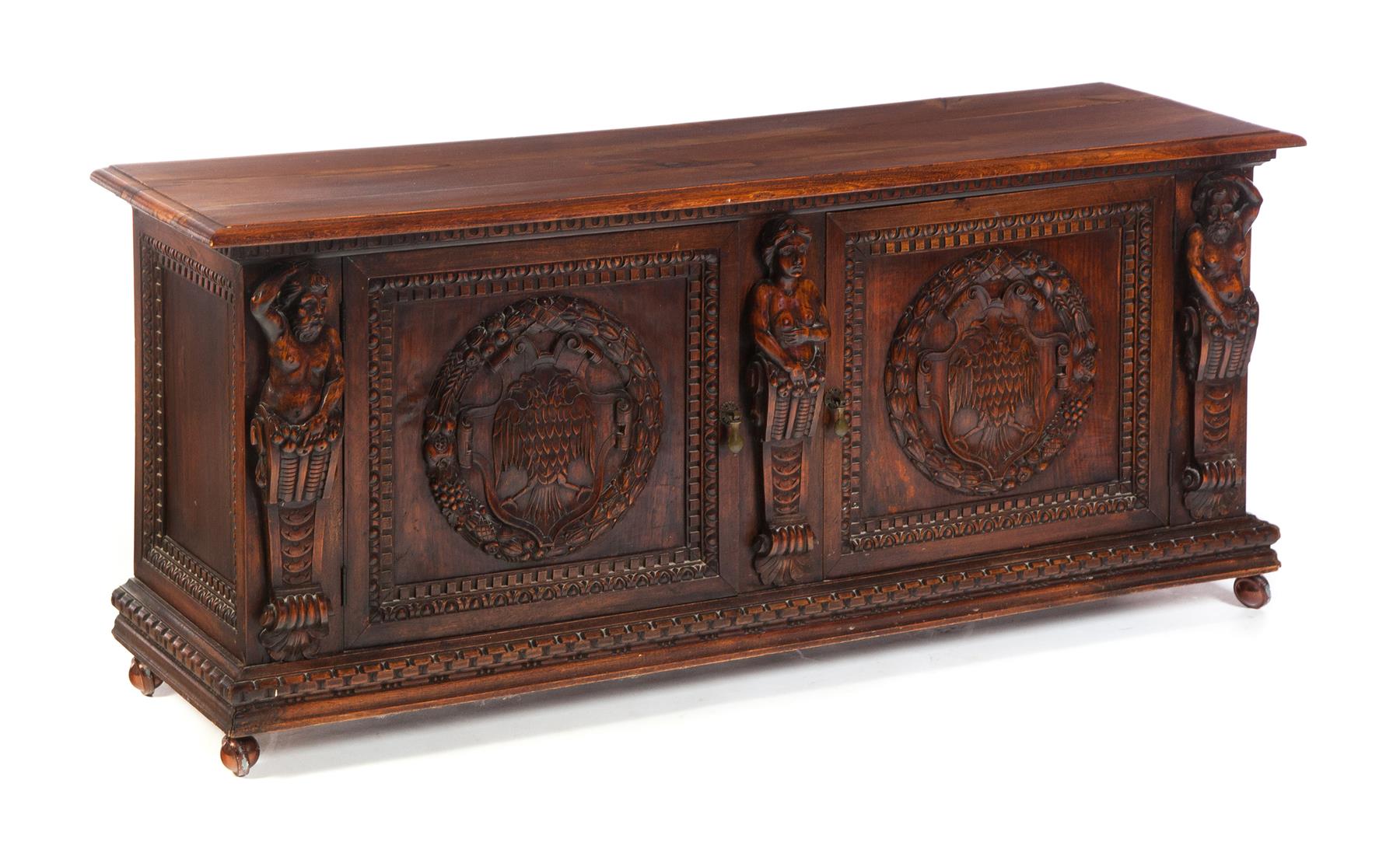 Appraisal: HEAVILY CARVED EUROPEAN LOW CABINET Fourth quarter- th century Three-board