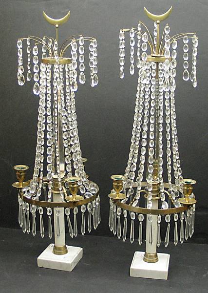 Appraisal: A pair of Swedish Neoclassical style gilt brass cut glass