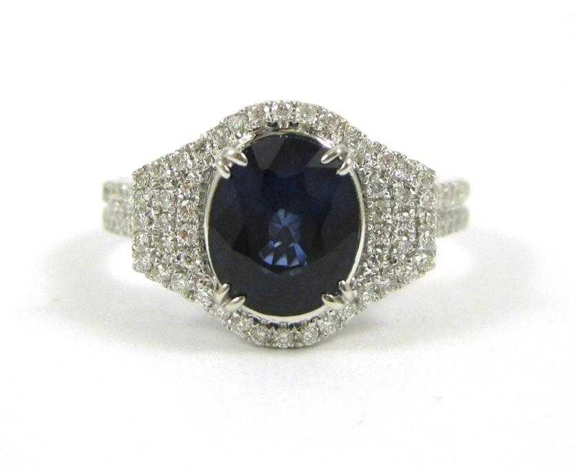 Appraisal: SAPPHIRE DIAMOND AND FOURTEEN KARAT GOLD RING The white gold